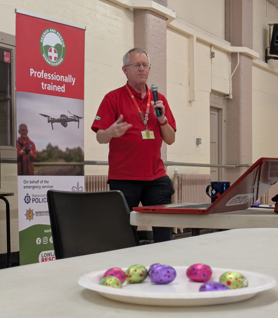 Bravely resisting the Easter chocolate, Ian explains to Coventry Sherbourne u3a about Warwickshire Search and Rescue